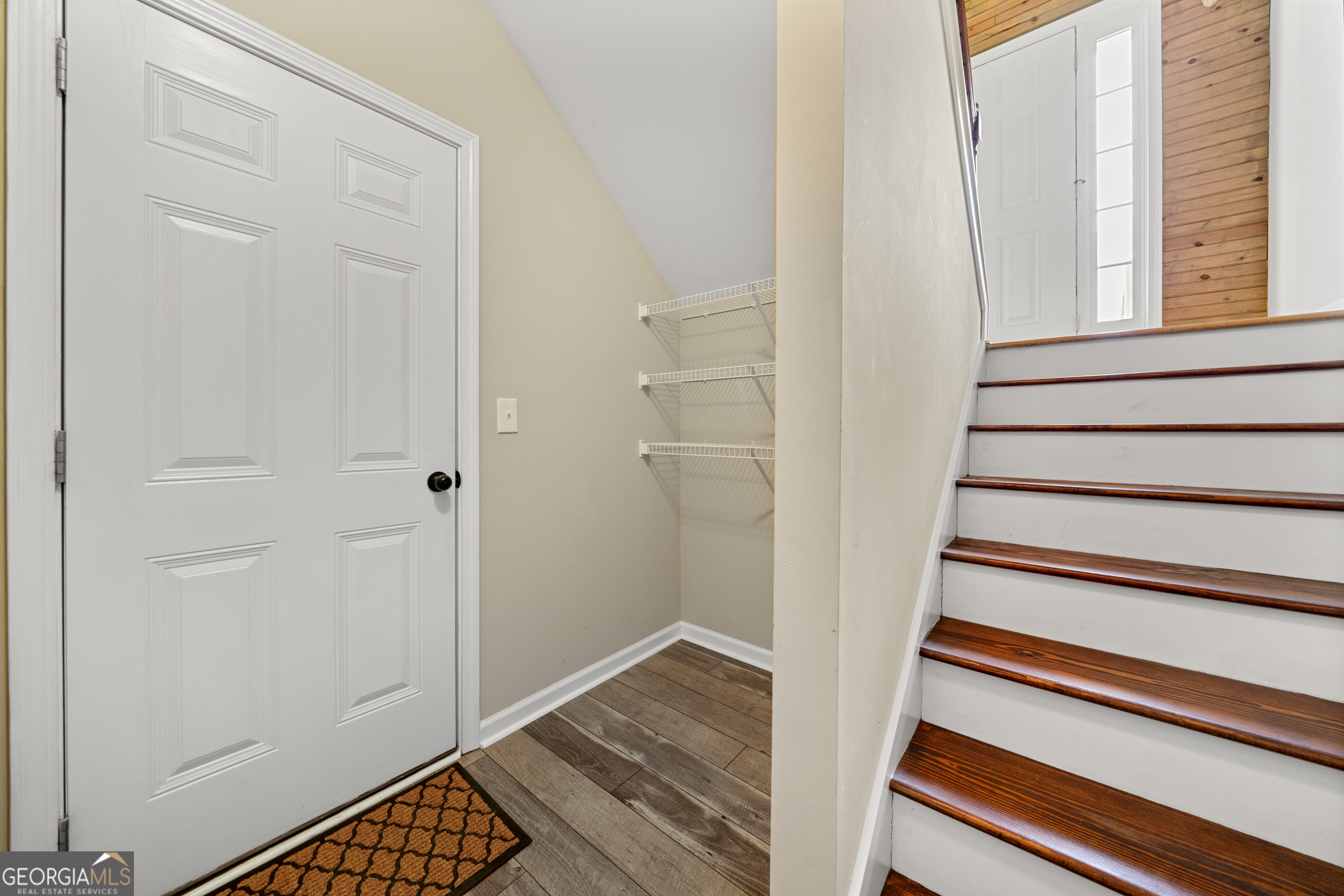 304 Kodiak Road Carrollton, GA 30117 - Photo 32 of 36 a view of entryway with wooden floor and stairs