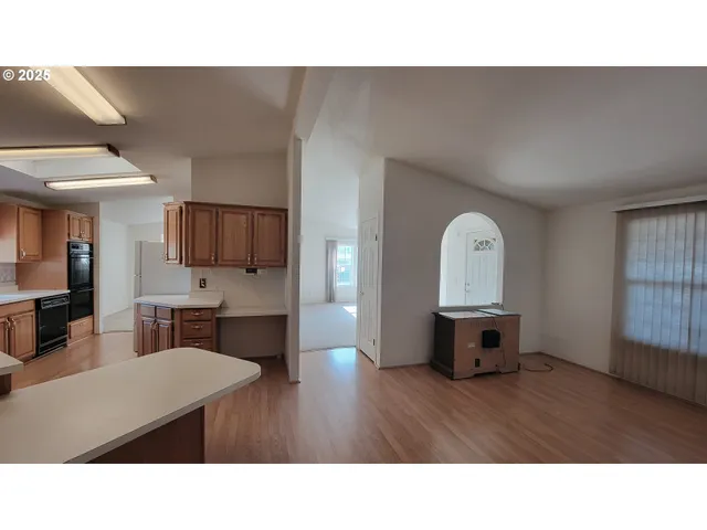 a black and white photo of a living room