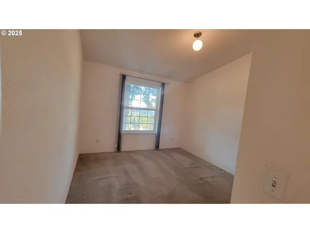 a open living room with a couch