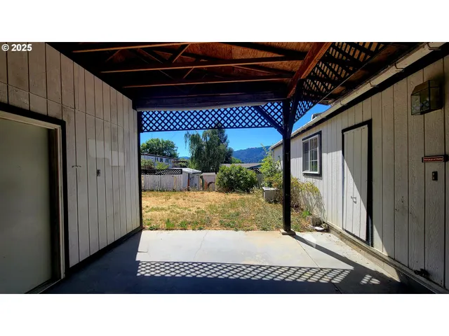 a black and white photo of a house