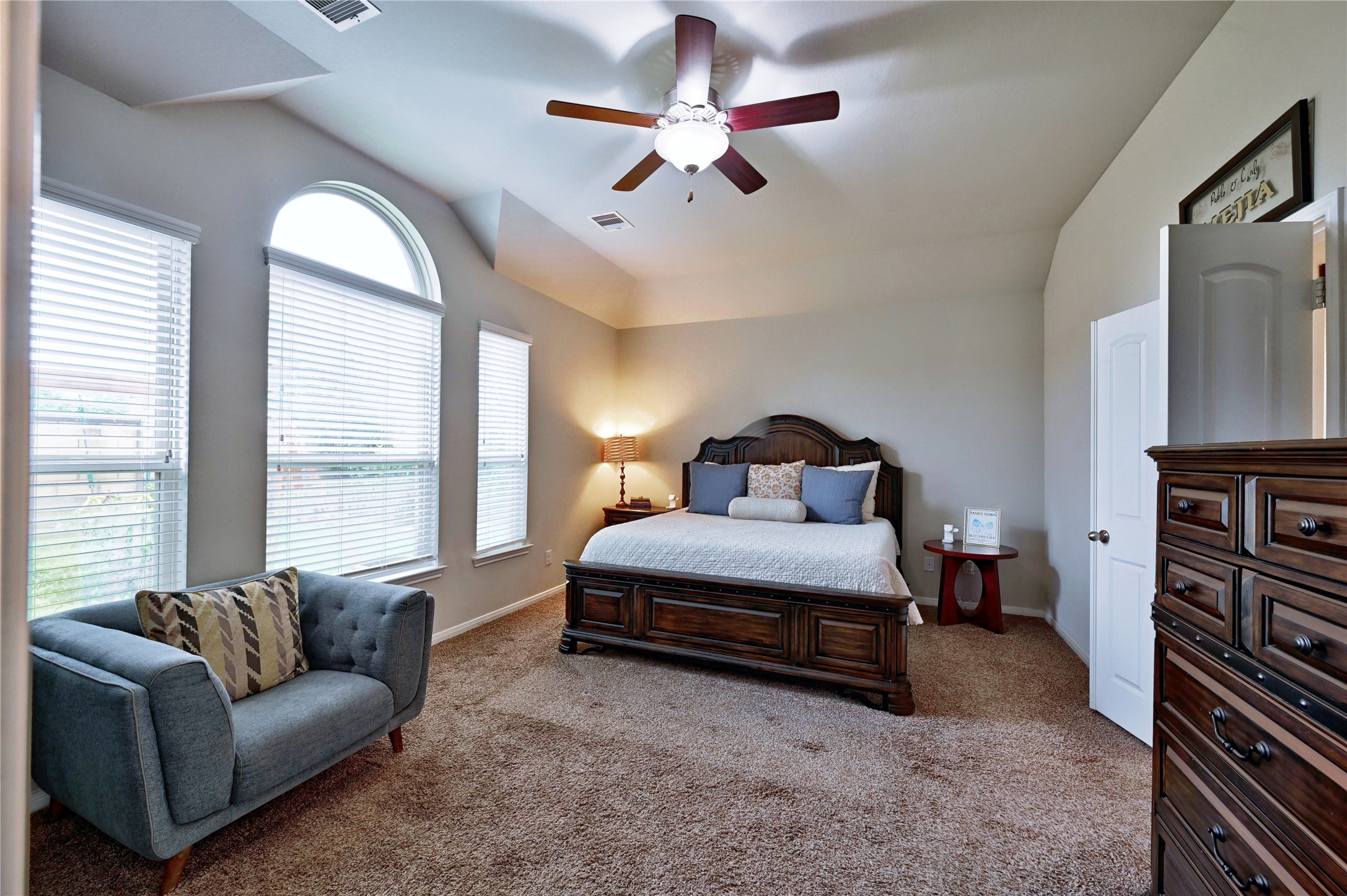 23118 Southern Brk Trail Spring, TX 77389 - Photo 25 of 50 A photo of the primary master bedroom. This oversized bedroom accommodates a king bed an extra large chair and two large dresser drawers!