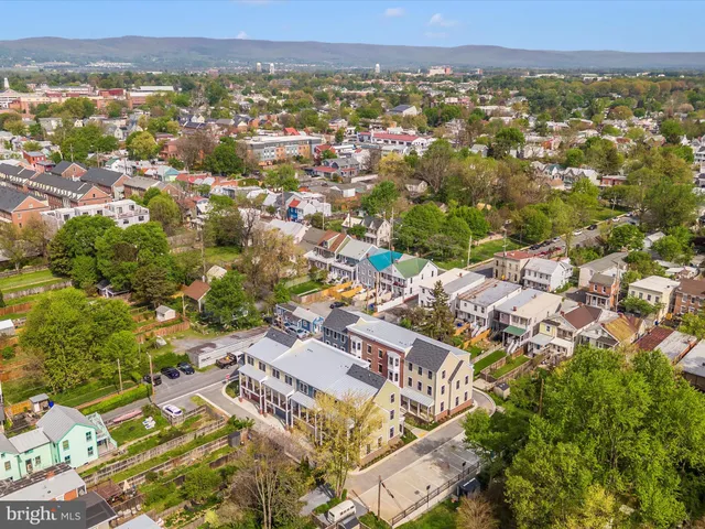 an aerial view of residential house with outdoor space