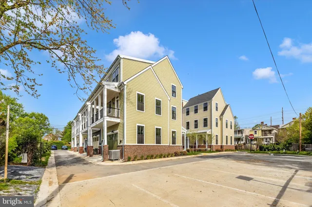 a view of a building with a street
