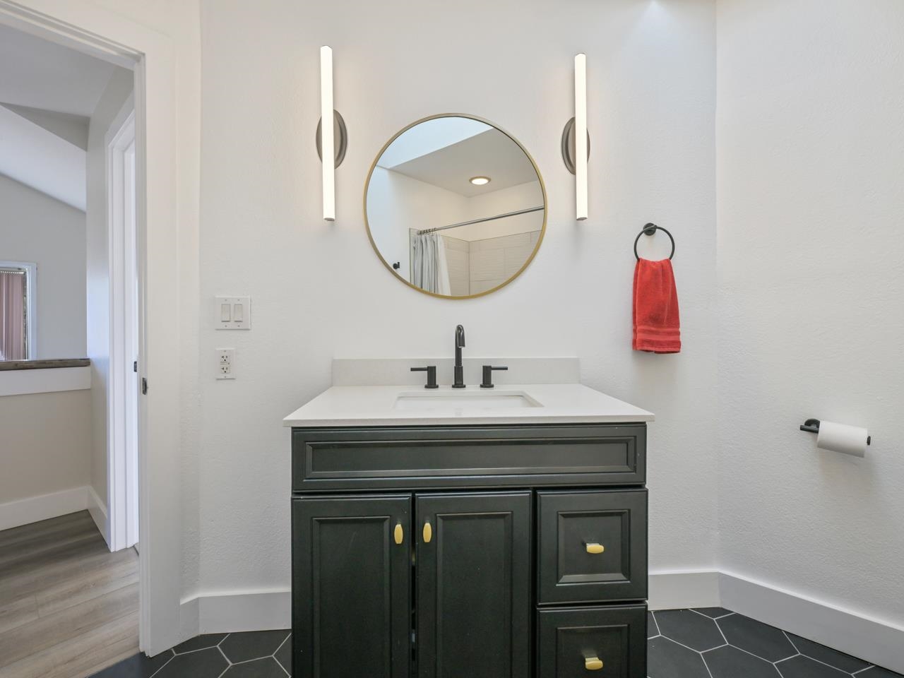 383 Explorer Court, Unit B Grand Junction, CO 81507 - Photo 26 of 40 a bathroom with a sink vanity and a mirror