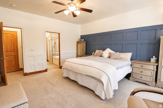 1055 North 1000 East Mapleton, UT 84664 - Photo 17 of 112 Bedroom featuring a distinctive blue accent wall with panel molding, neutral carpet flooring, and a ceiling fan with integrated lighting