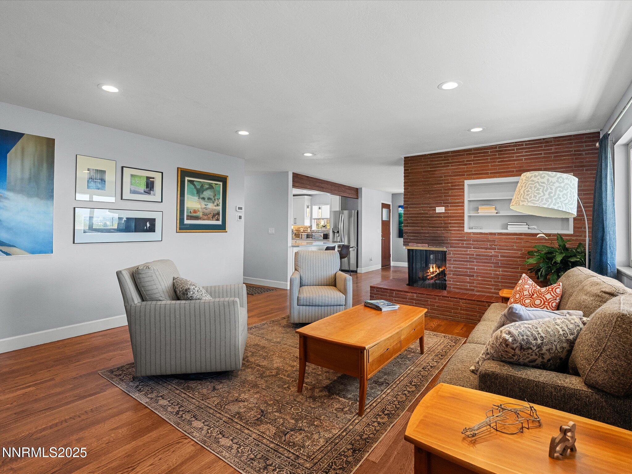 60 Redstone Drive Reno, NV 89512 - Photo 21 of 61 a living room with furniture and a wooden floor
