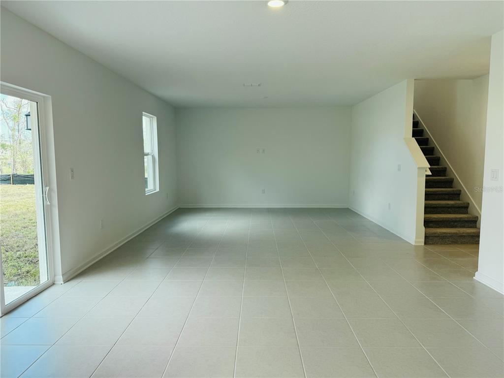 1386 Inkberry Circle DeLand, FL 32720 - Photo 3 of 16 an empty room with windows