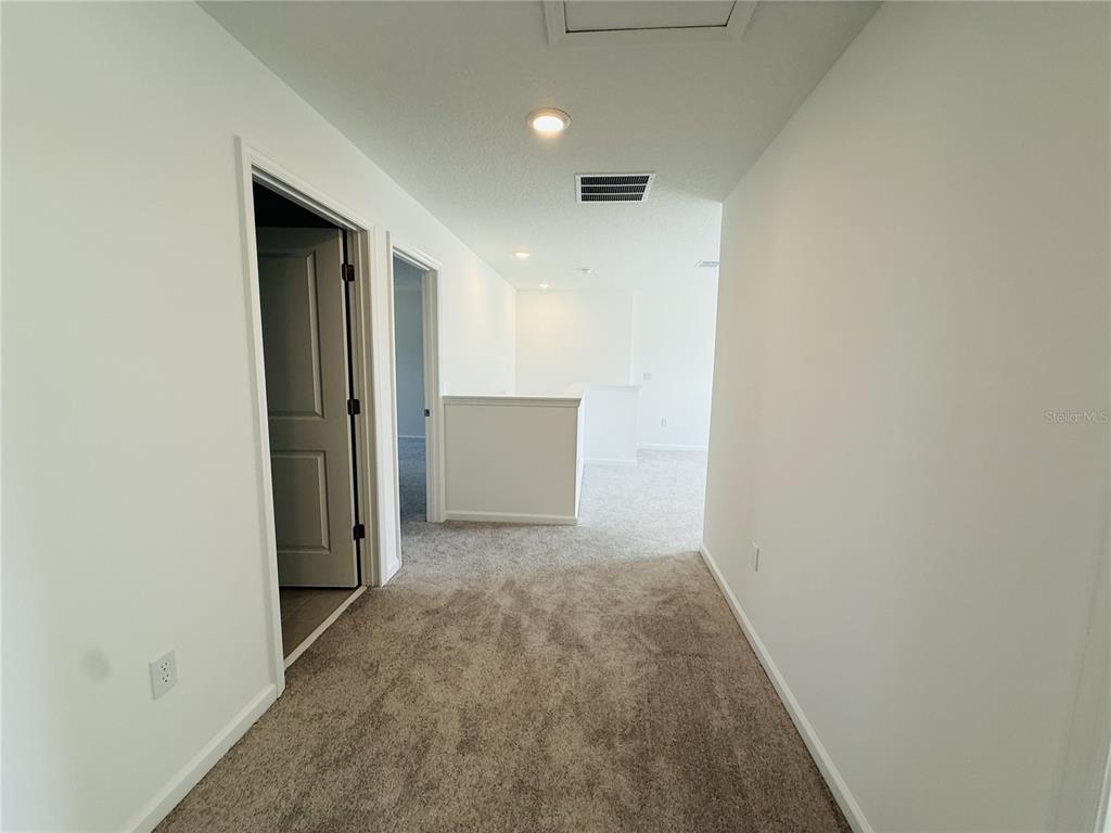 1386 Inkberry Circle DeLand, FL 32720 - Photo 6 of 16 a view of hallway