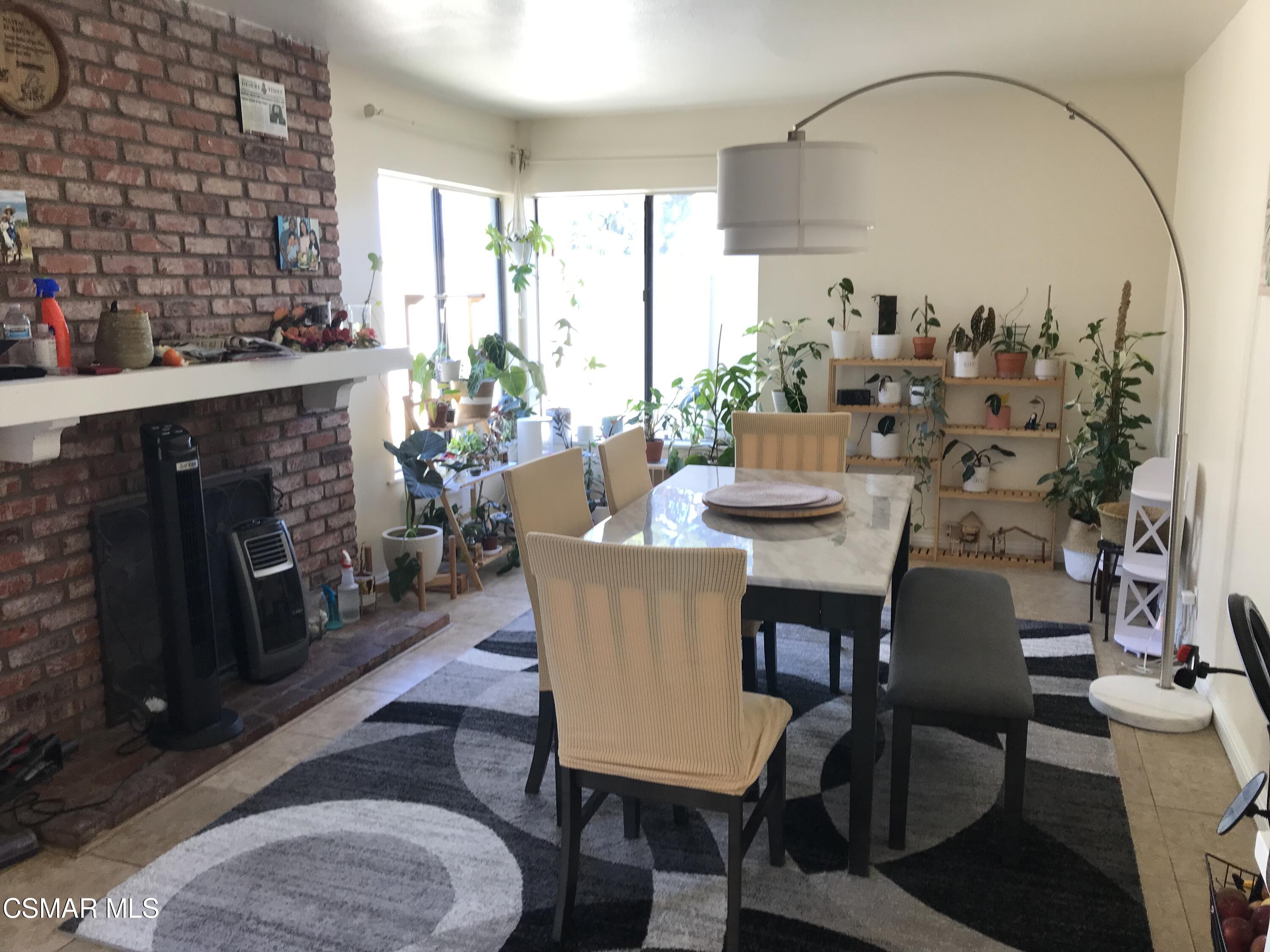 3460 Olds Road Oxnard, CA 93033 - Photo 5 of 12 a dining room with furniture window and wooden floor