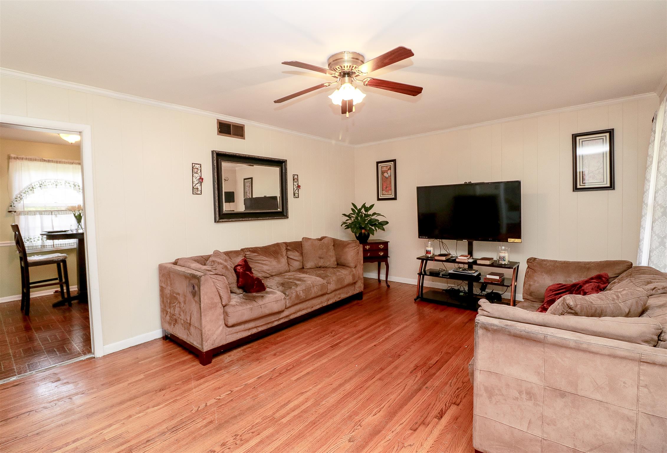 3016 Anderson Road Nashville, TN 37217 - Photo 8 of 25 a living room with furniture and a flat screen tv