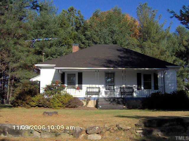 1009 Ridge Road Roxboro, NC 27573 - Photo 2 of 2 a view of a house with pool table and chairs