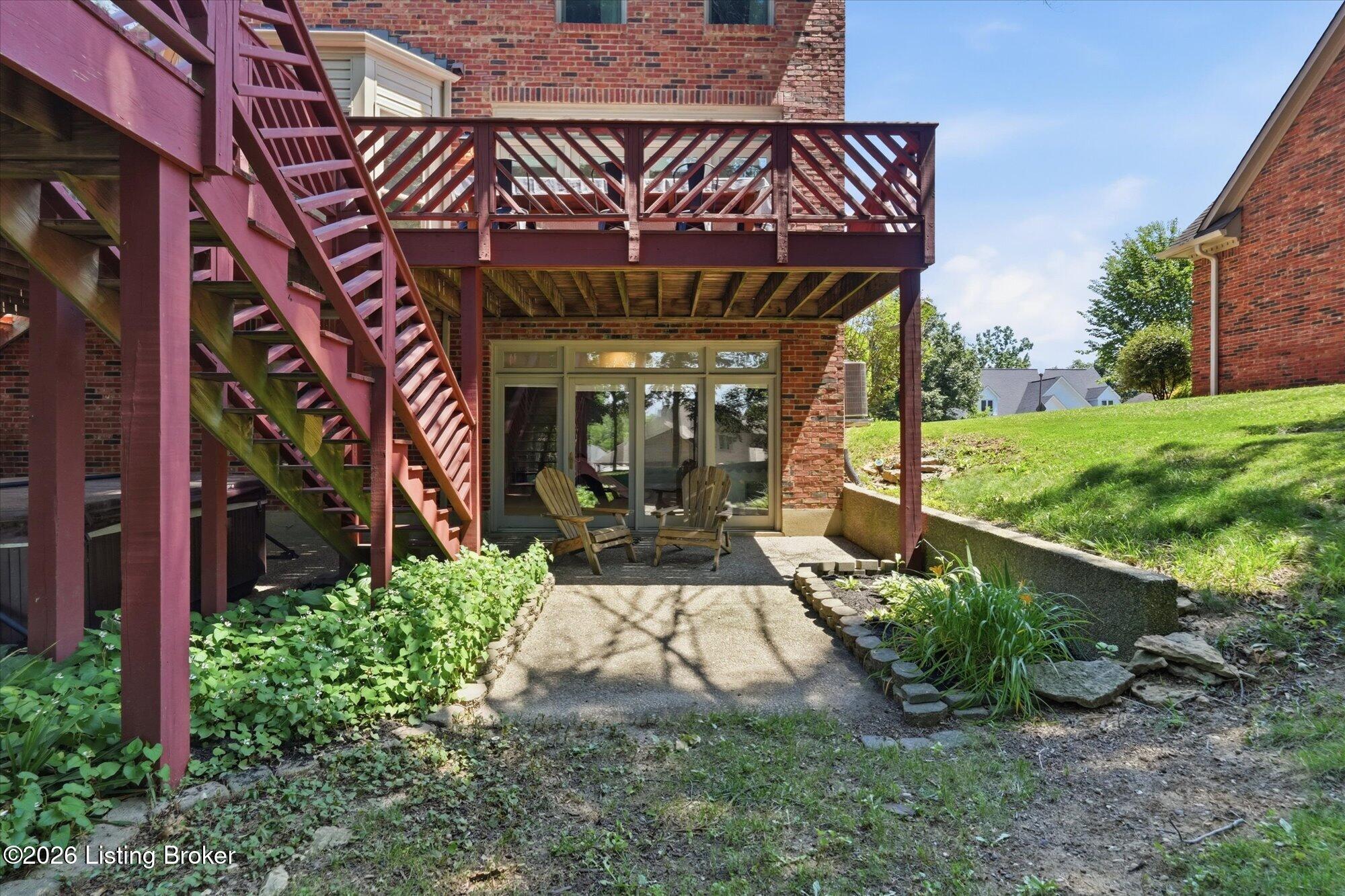 5722 Moser Farm Road Prospect, KY 40059 - Photo 44 of 65 The open flex space extends seamlessly outdoors with direct access to the patio, backyard, and hot tub.
