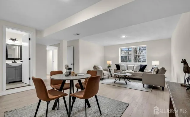 a living room with furniture and a table