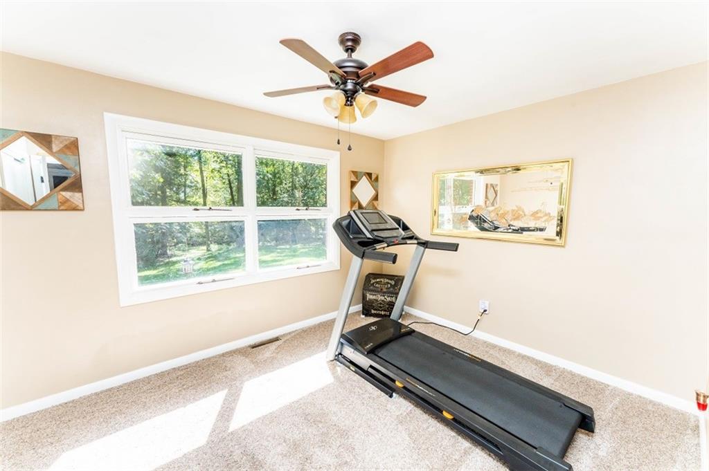 793 Rustic Lodge Road Indiana, PA 15701 - Photo 12 of 22 a room with gym equipment and windows