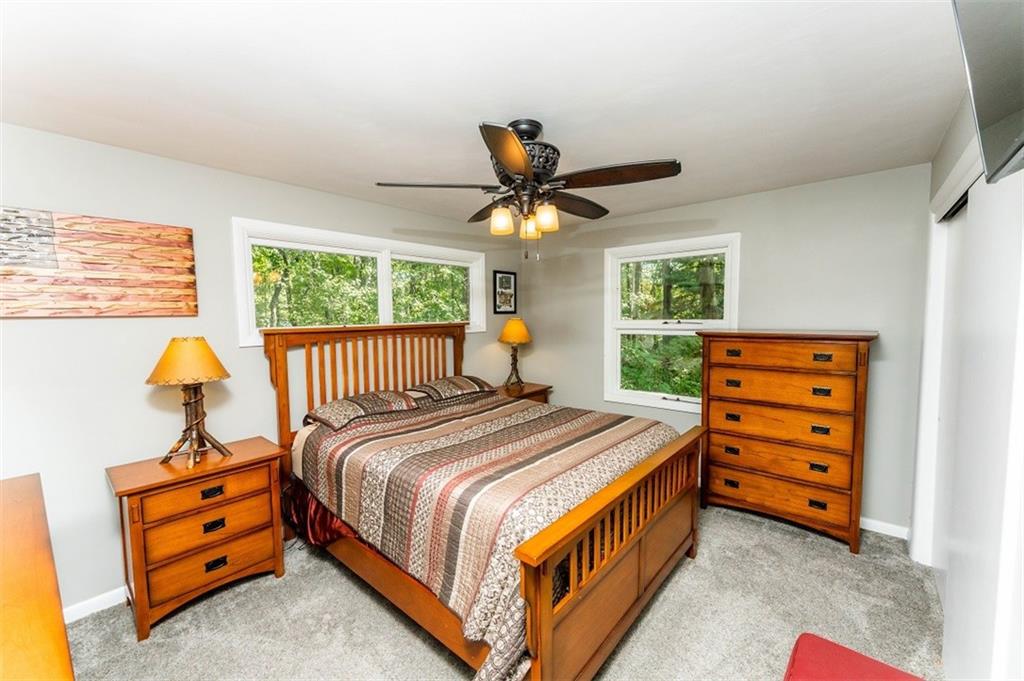 793 Rustic Lodge Road Indiana, PA 15701 - Photo 13 of 22 a bed room with a bed and a window