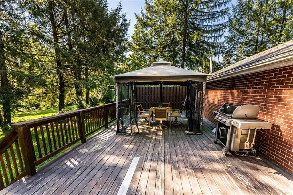 793 Rustic Lodge Road Indiana, PA 15701 - Photo 20 of 22 a view of a deck with wooden floor and outdoor seating