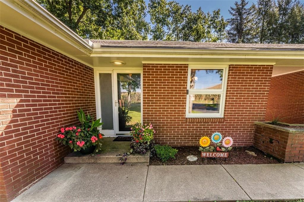 793 Rustic Lodge Road Indiana, PA 15701 - Photo 21 of 22 a view of a door and chair and potted plants