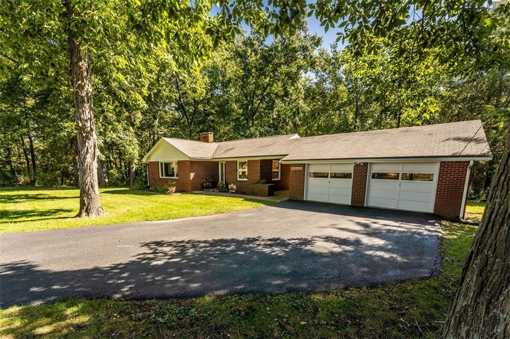 793 Rustic Lodge Road Indiana, PA 15701 - Photo 22 of 22 a view of a house with pool and sitting area