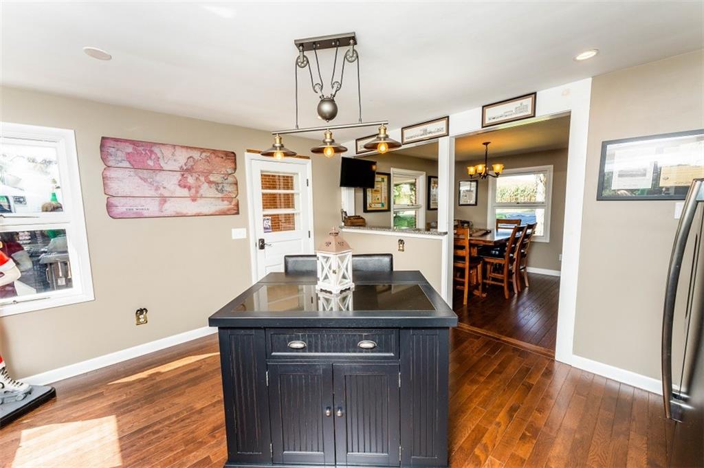 793 Rustic Lodge Road Indiana, PA 15701 - Photo 4 of 22 a kitchen with a refrigerator and a table