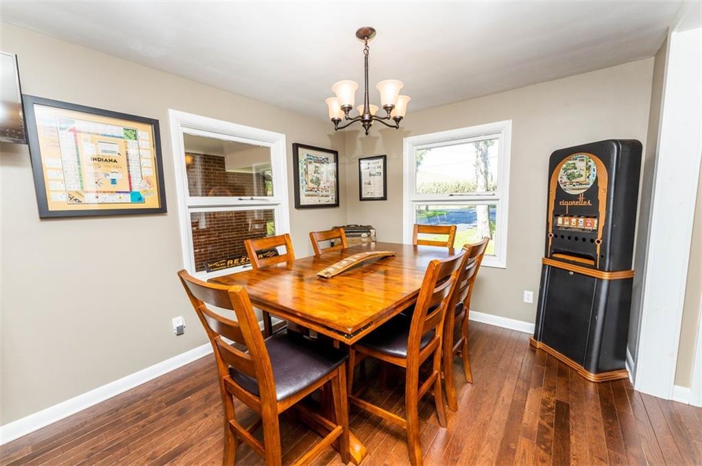 793 Rustic Lodge Road Indiana, PA 15701 - Photo 5 of 22 a dining room with furniture a chandelier and wooden floor