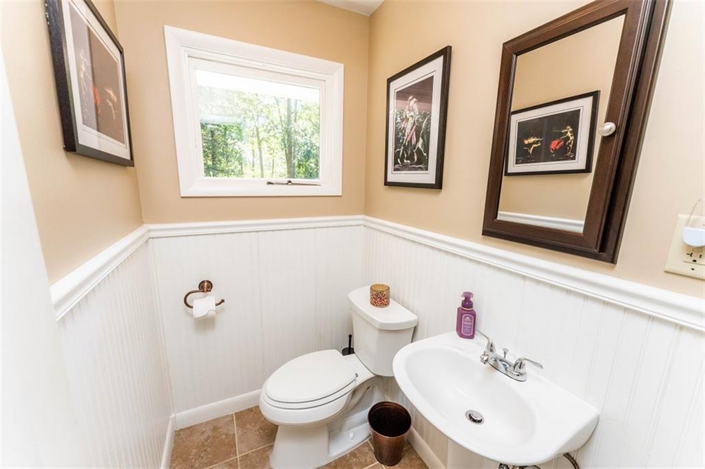 793 Rustic Lodge Road Indiana, PA 15701 - Photo 9 of 22 a bathroom with a toilet sink and mirror