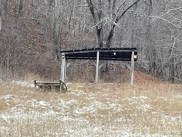 7305 Big Back Creek Road Warm Springs, VA 24484 - Photo 10 of 13 a backyard of a house with table and chairs