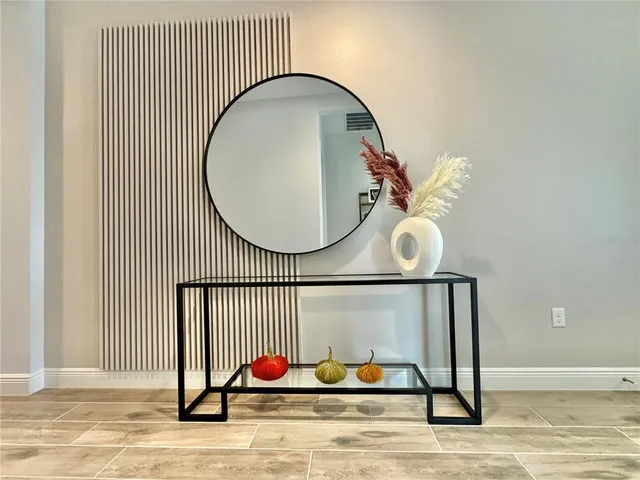 a bathroom with a shower and a bath tub