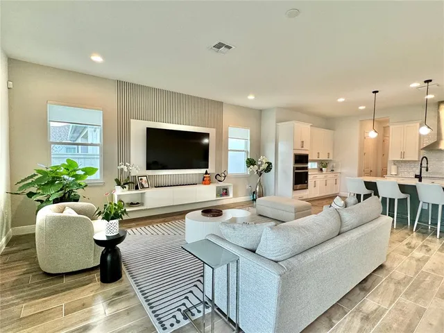 a view of a hallway with wooden shelves