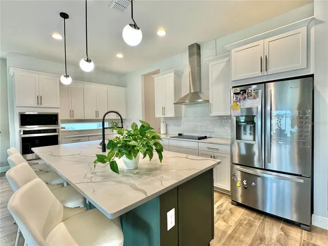 a spacious bedroom with a large bed and a window