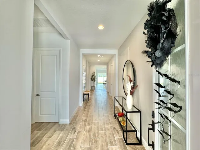 a bedroom with a bed and a table