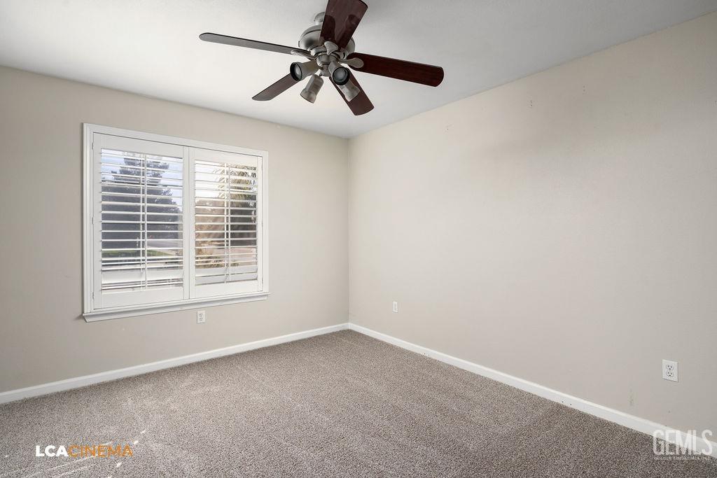 Undisclosed Address Bakersfield, CA 93312 - Photo 11 of 28 a view of an empty room with a window