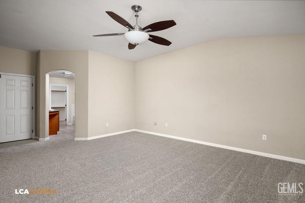 Undisclosed Address Bakersfield, CA 93312 - Photo 15 of 28 an empty room with closet and windows