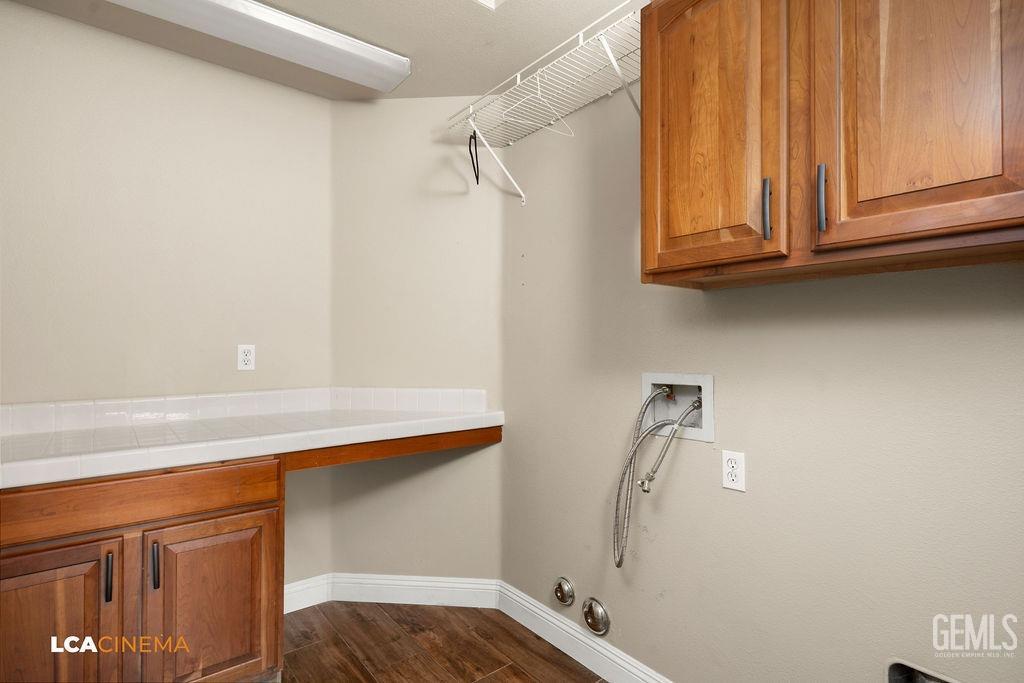 Undisclosed Address Bakersfield, CA 93312 - Photo 23 of 28 a bathroom with a sink and a mirror