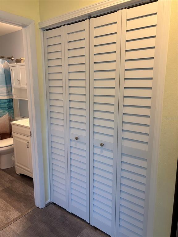 14531 Walsingham Road, Unit 225 Largo, FL 33774 - Photo 14 of 17 a view of a bathroom with a shower