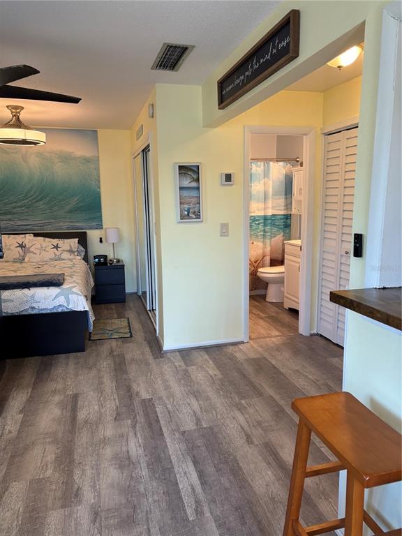 14531 Walsingham Road, Unit 225 Largo, FL 33774 - Photo 2 of 17 a living room with furniture and a large window