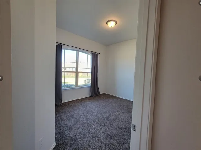 a view of empty room with window