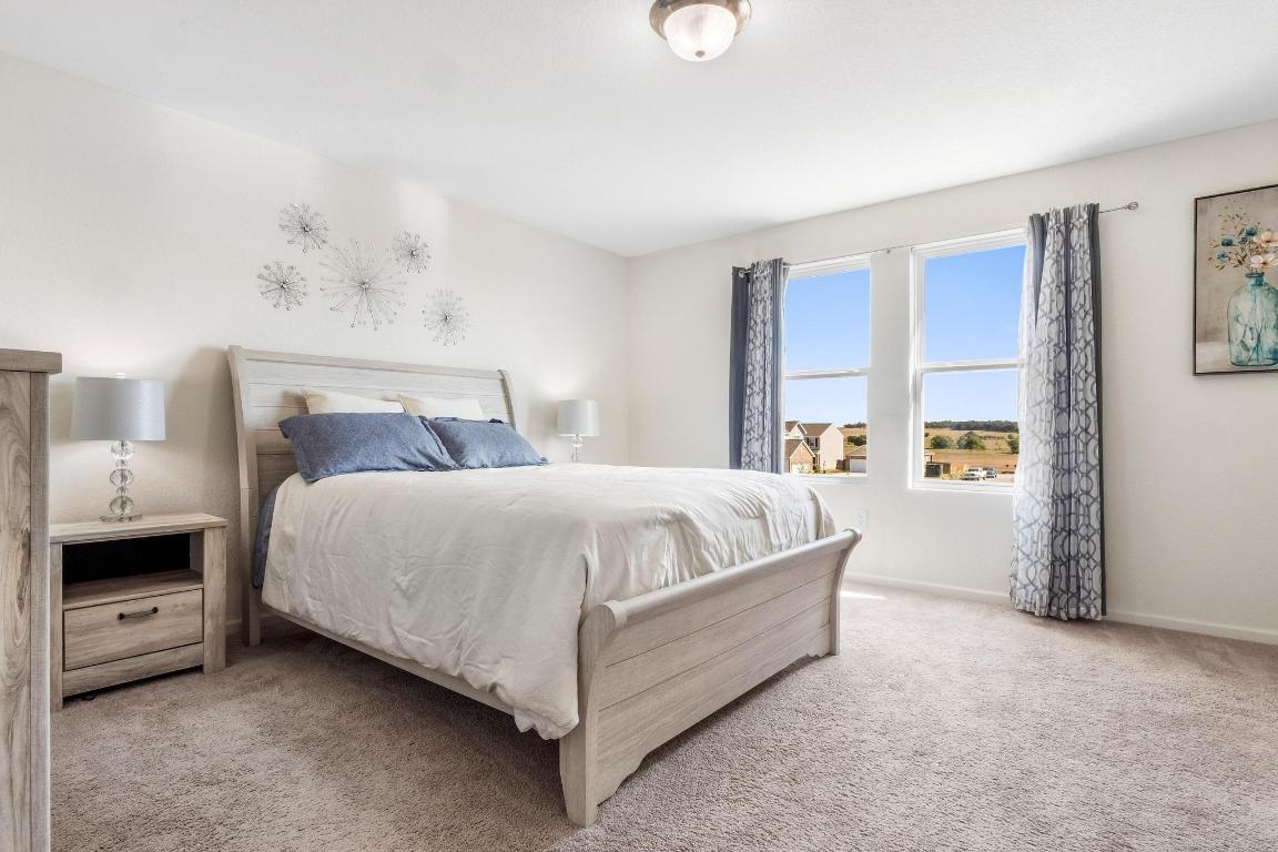 101 Magnum Force Drive Jarrell, TX 76537 - Photo 16 of 29 a bed room with a bed and a night stand