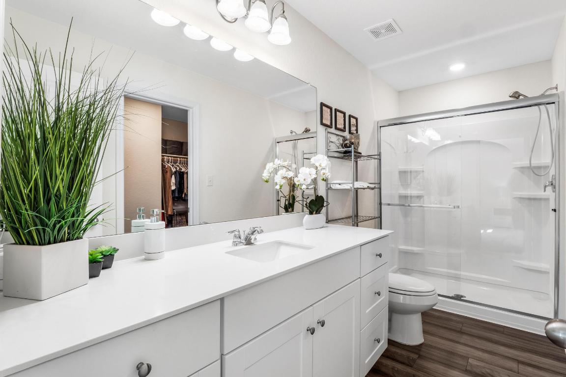 101 Magnum Force Drive Jarrell, TX 76537 - Photo 21 of 29 a bathroom with a sink a toilet and shower