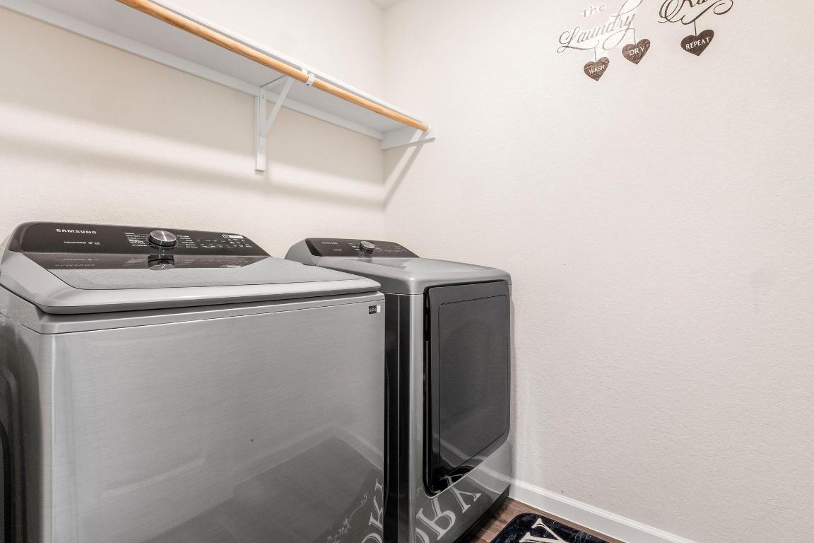 101 Magnum Force Drive Jarrell, TX 76537 - Photo 22 of 29 a utility room with dryer and washer