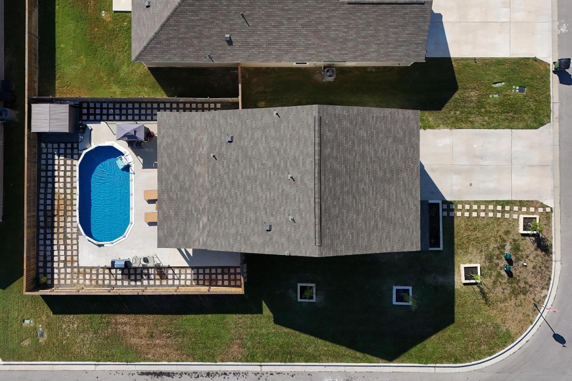 101 Magnum Force Drive Jarrell, TX 76537 - Photo 6 of 29 an aerial view of a house with a swimming pool