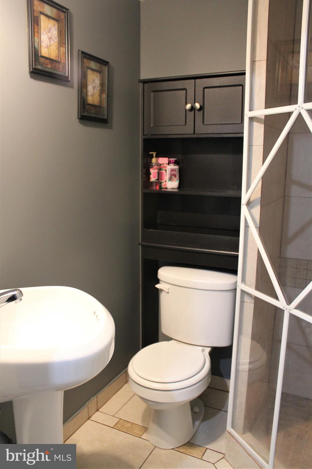 4072 Rustico Road Baltimore, MD 21220 - Photo 36 of 46 Basement Bathroom with corner shower