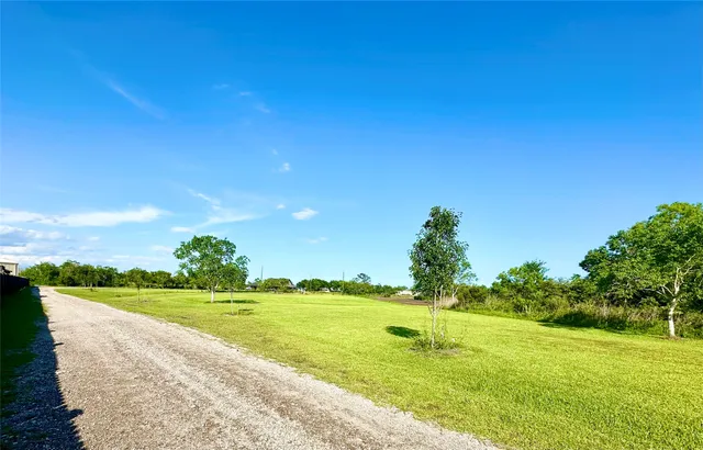 a view of an ocean from a big yard