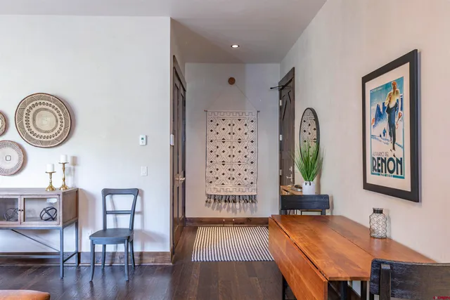 a view of a room with furniture window and wooden floor
