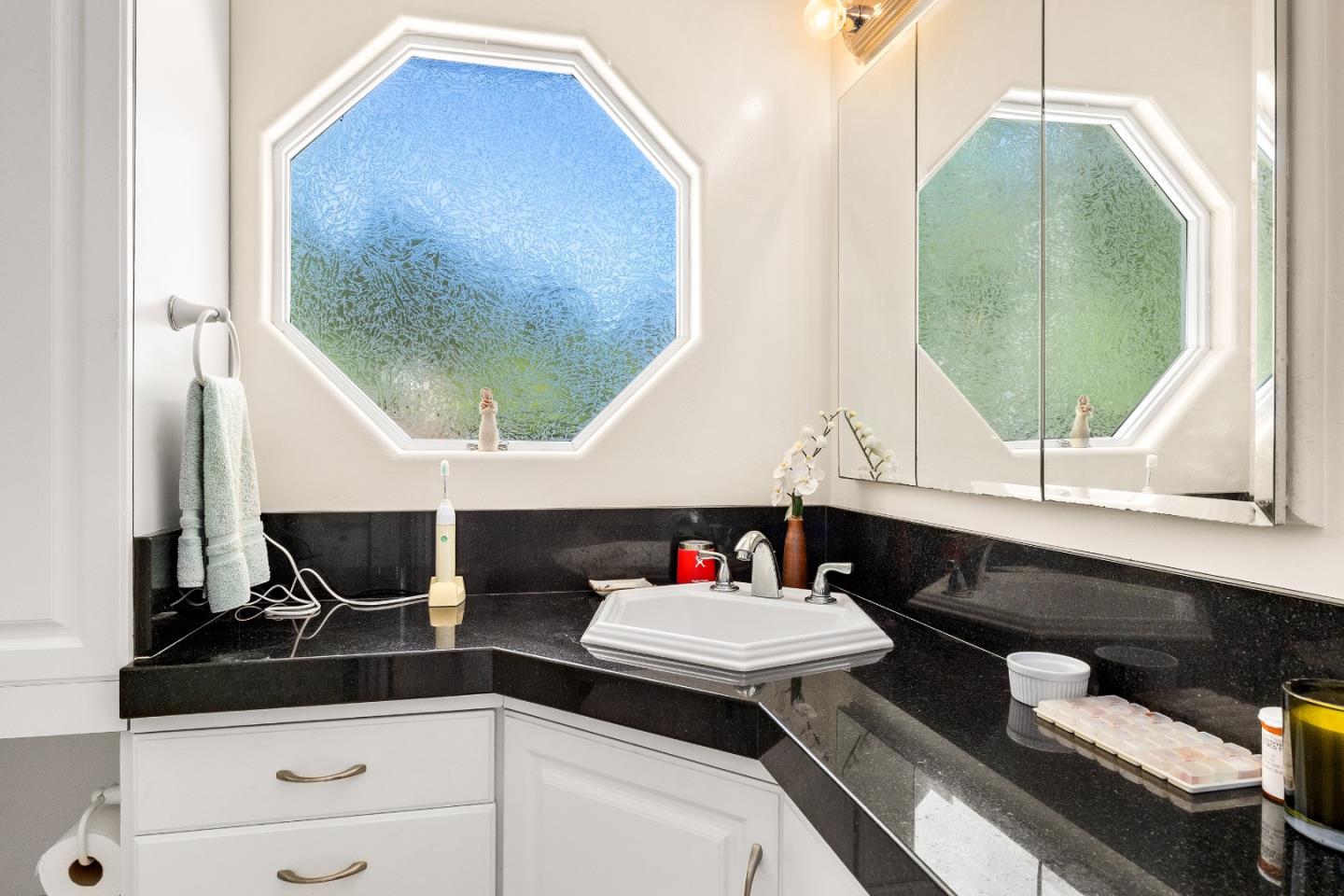 2000 Glen Canyon Road Santa Cruz, CA 95060 - Photo 22 of 41 a bathroom with a sink and a mirror