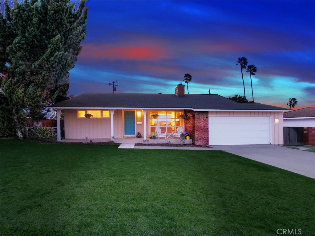 156 Vía Los Altos Redondo Beach, CA 90277 - Photo 2 of 25 a backyard of a house with table and chairs