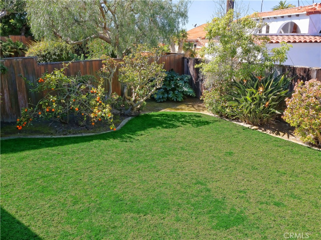 156 Vía Los Altos Redondo Beach, CA 90277 - Photo 22 of 25 a view of a garden with flowers