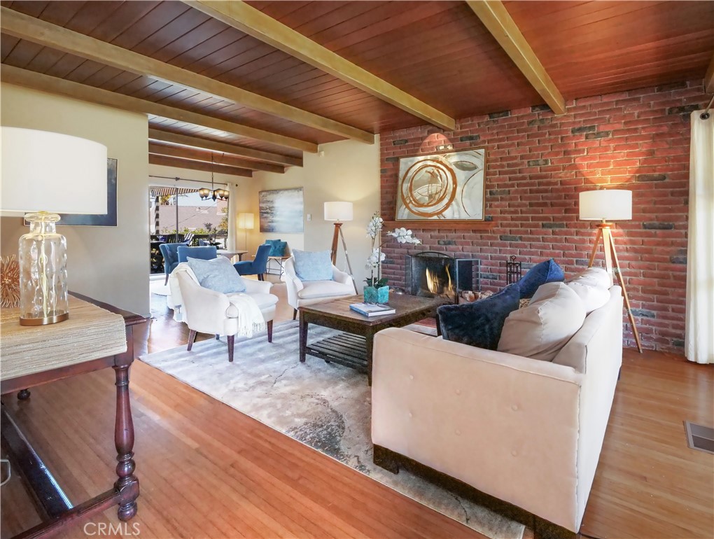 156 Vía Los Altos Redondo Beach, CA 90277 - Photo 5 of 25 a living room with furniture and a wooden floor
