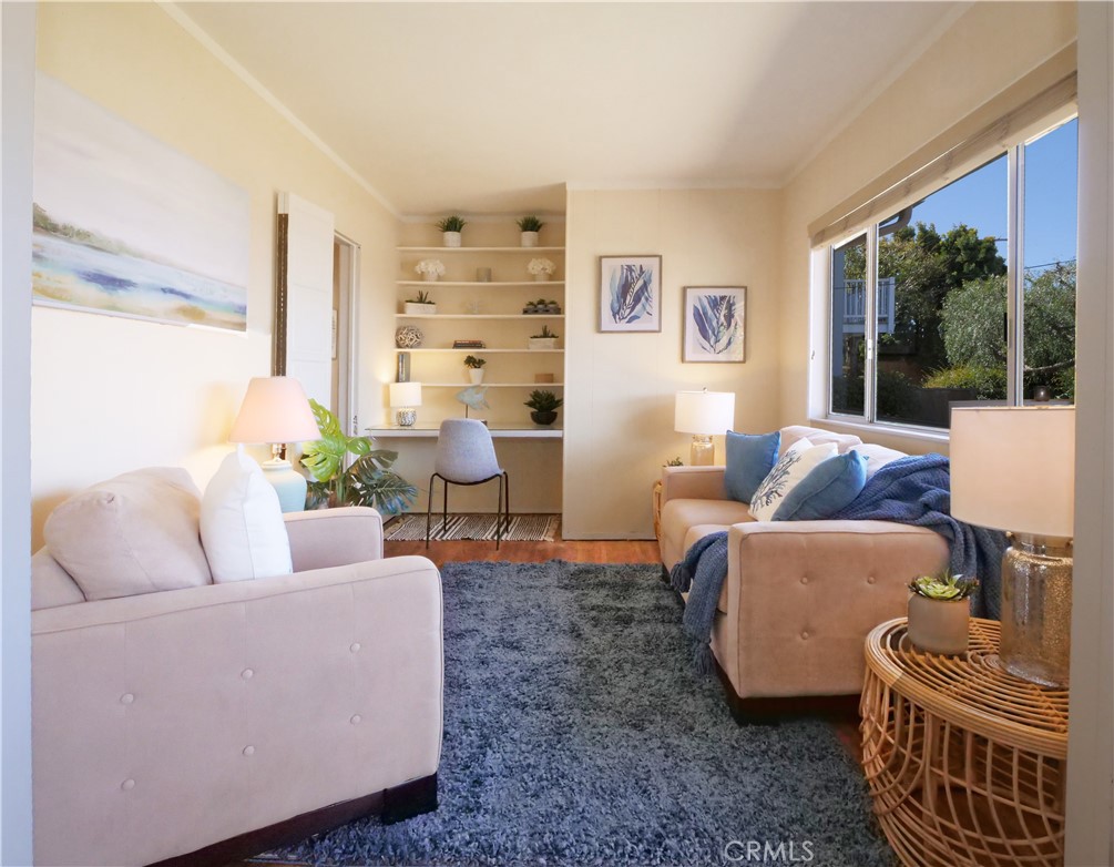 156 Vía Los Altos Redondo Beach, CA 90277 - Photo 9 of 25 a living room with furniture and a large window