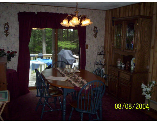 207 Sherbert Road Ashburnham, MA 01430 - Photo 4 of 7 a view of a dining room with furniture window and outside view