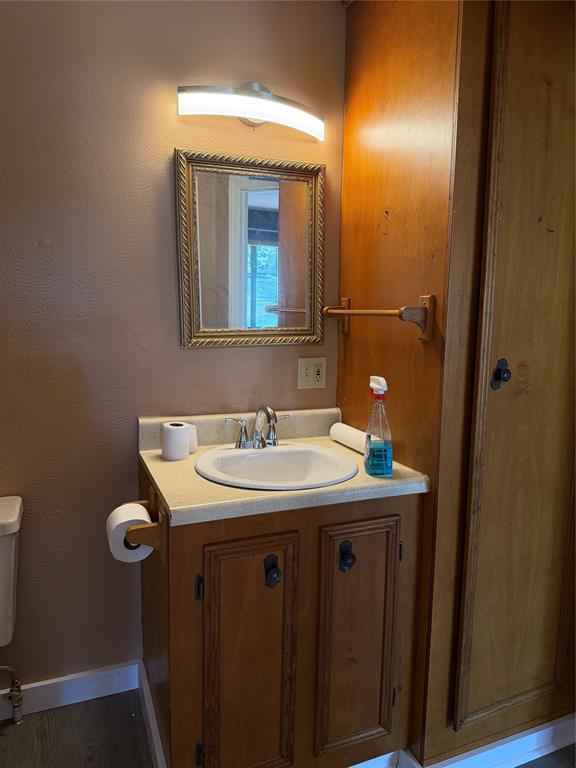 263 Highway 154 Ringgold, LA 71068 - Photo 16 of 38 Half bath featuring vanity and toilet